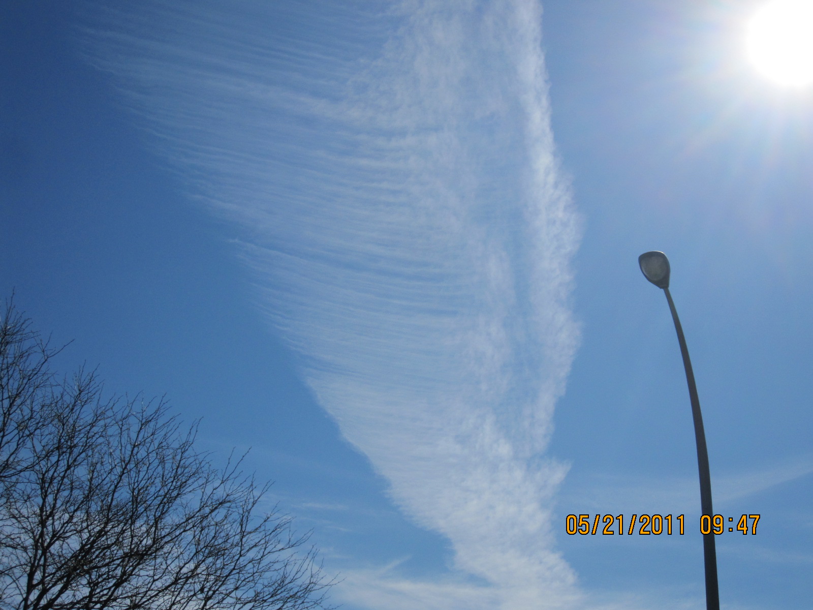 CHEMTRAILS slowly widening and thining out, blocking VITAMIN D, and dumping ALUMINUM OXIDES damaging soil by raising PH of the soil.
